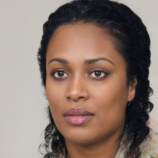 Neutral black young-adult female with long  black hair and brown eyes