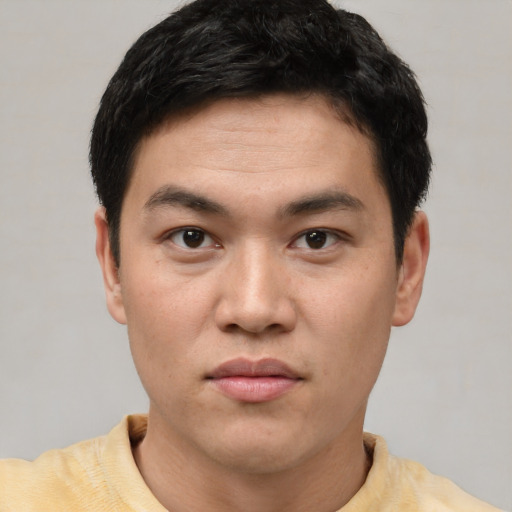 Neutral white young-adult male with short  black hair and brown eyes