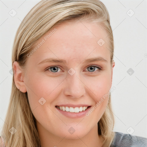 Joyful white young-adult female with long  brown hair and blue eyes