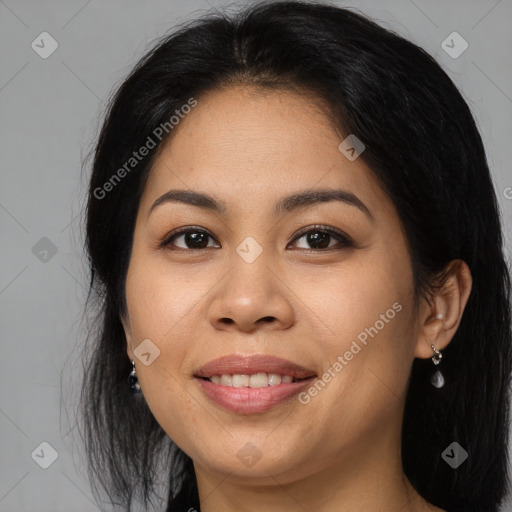 Joyful asian young-adult female with long  brown hair and brown eyes