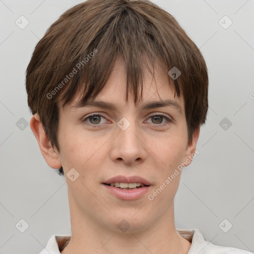 Joyful white young-adult female with short  brown hair and grey eyes