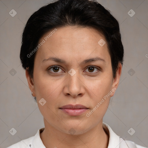 Joyful white adult female with short  brown hair and brown eyes