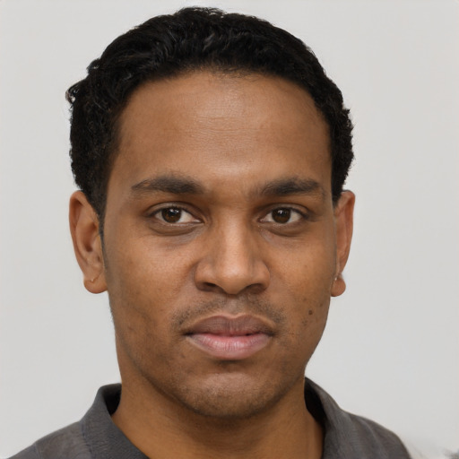 Neutral black young-adult male with short  black hair and brown eyes