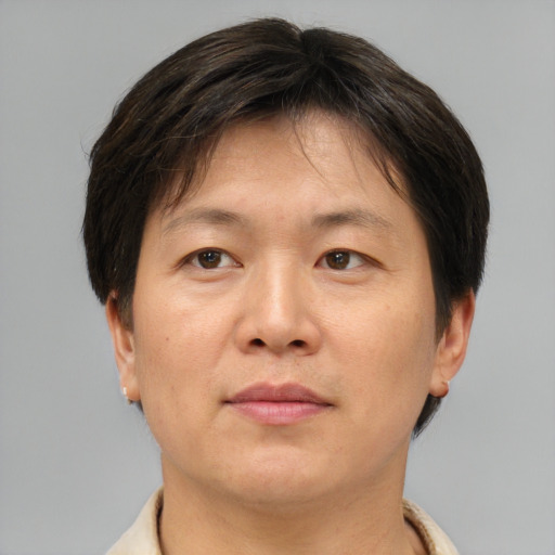 Neutral asian adult male with short  brown hair and brown eyes