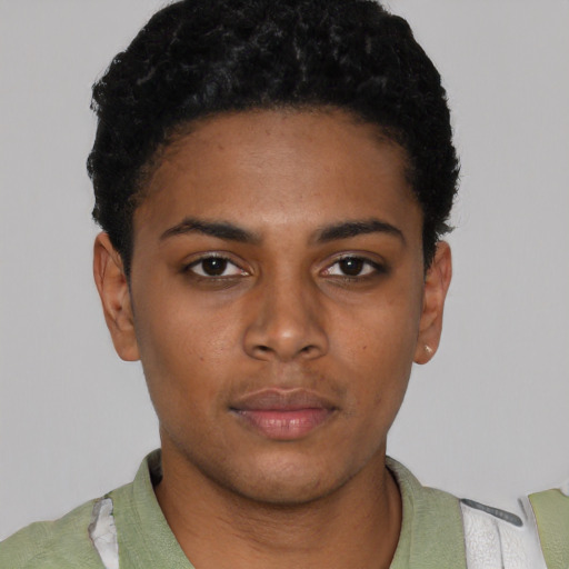 Neutral black young-adult female with short  black hair and brown eyes