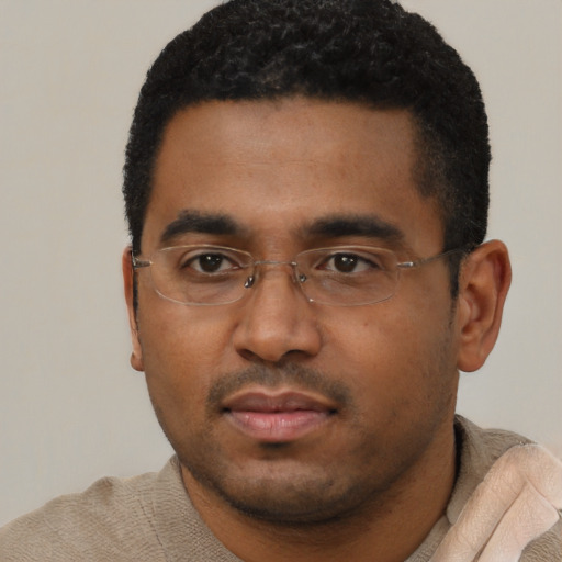 Neutral black young-adult male with short  black hair and brown eyes