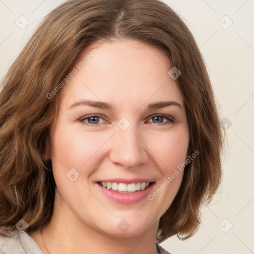 Joyful white young-adult female with medium  brown hair and green eyes