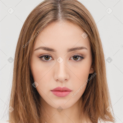 Neutral white young-adult female with long  brown hair and brown eyes