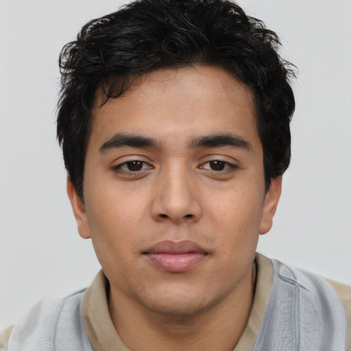 Neutral latino young-adult male with short  brown hair and brown eyes