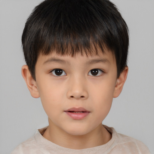 Neutral asian child male with short  brown hair and brown eyes