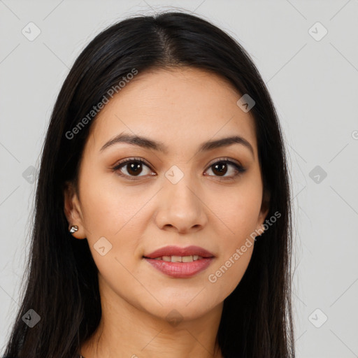 Joyful latino young-adult female with long  brown hair and brown eyes