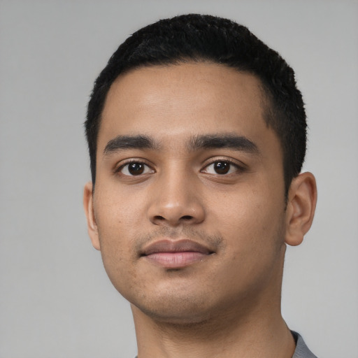 Neutral latino young-adult male with short  black hair and brown eyes
