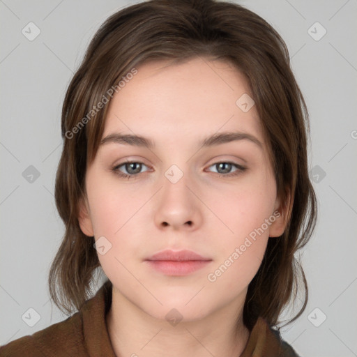 Neutral white young-adult female with medium  brown hair and brown eyes