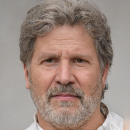 Neutral white middle-aged male with short  gray hair and brown eyes