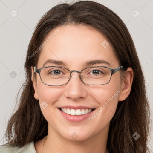 Joyful white young-adult female with long  brown hair and grey eyes