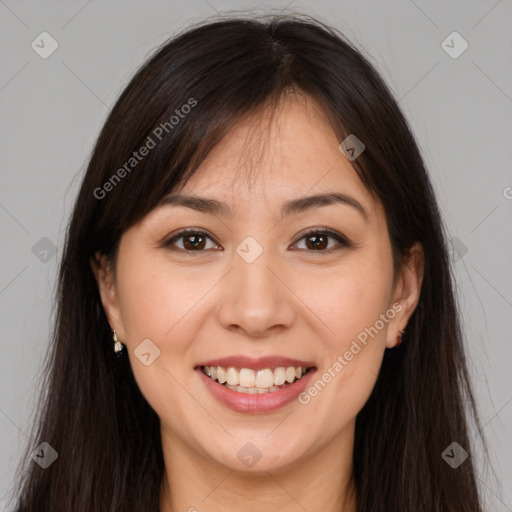 Joyful white young-adult female with long  brown hair and brown eyes