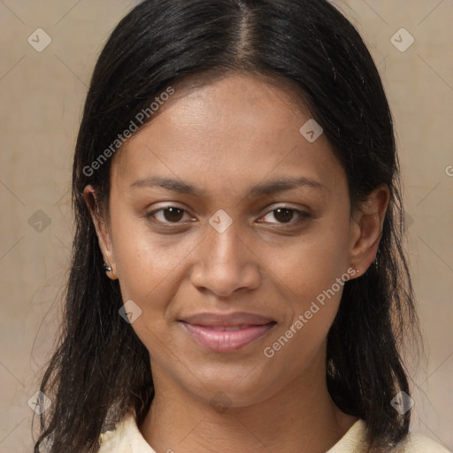 Joyful latino young-adult female with medium  brown hair and brown eyes