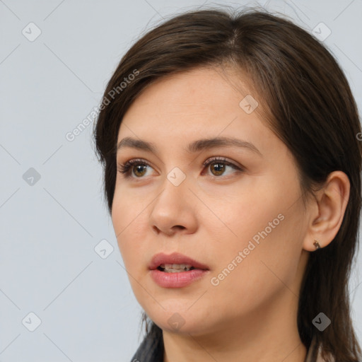 Neutral white young-adult female with medium  brown hair and brown eyes