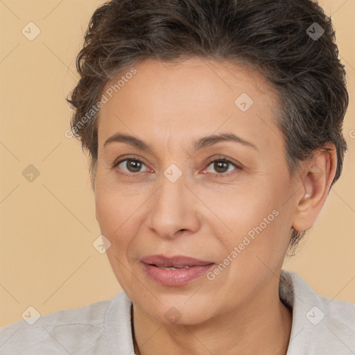 Joyful white adult female with short  brown hair and brown eyes