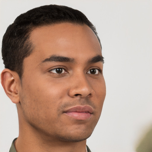 Neutral latino young-adult male with short  brown hair and brown eyes