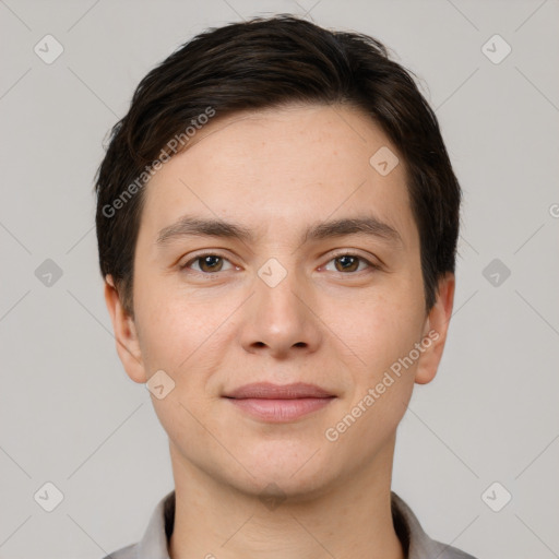 Joyful white young-adult male with short  brown hair and brown eyes