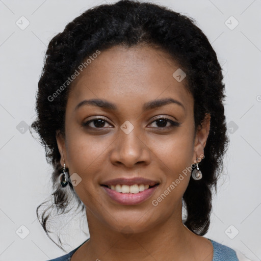 Joyful black young-adult female with medium  black hair and brown eyes