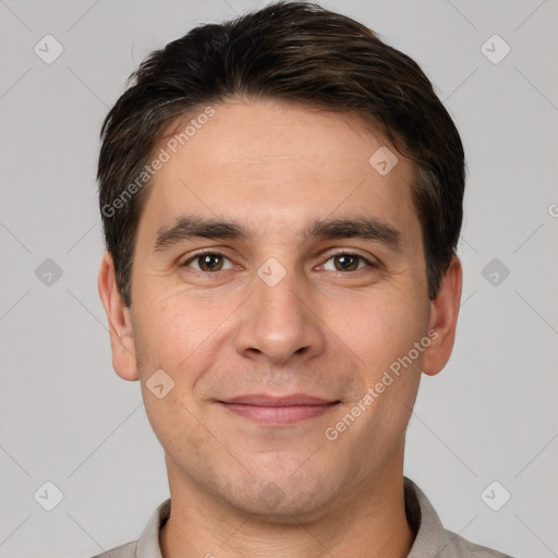 Joyful white young-adult male with short  brown hair and brown eyes