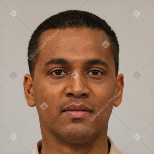 Neutral latino young-adult male with short  brown hair and brown eyes