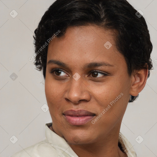 Joyful latino young-adult female with short  brown hair and brown eyes