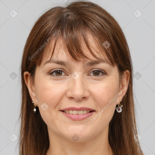 Joyful white adult female with medium  brown hair and brown eyes