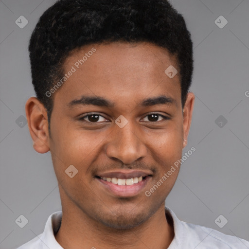 Joyful black young-adult male with short  brown hair and brown eyes