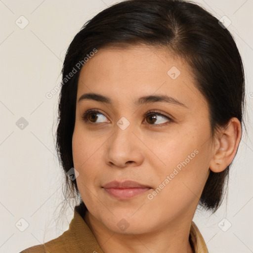Joyful asian young-adult female with medium  brown hair and brown eyes