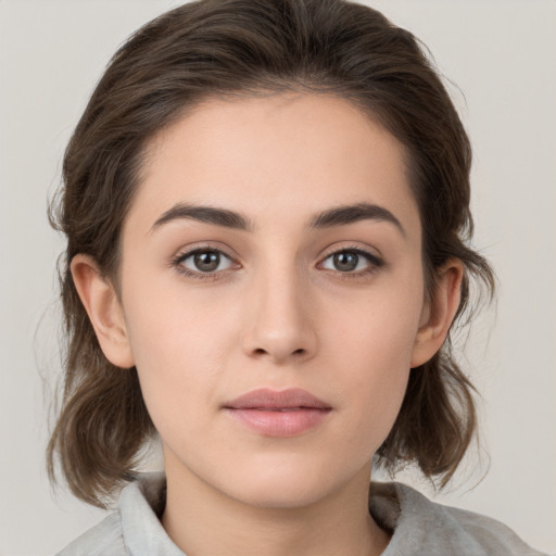 Neutral white young-adult female with medium  brown hair and brown eyes