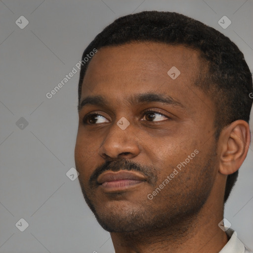 Neutral black young-adult male with short  black hair and brown eyes