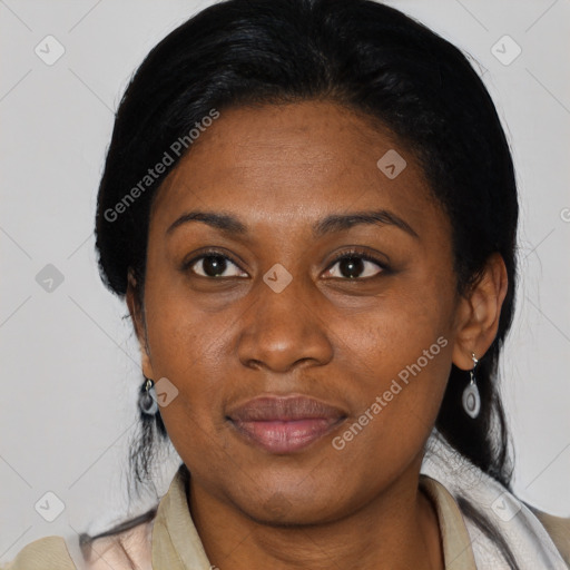 Joyful latino adult female with medium  black hair and brown eyes