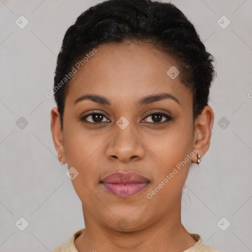 Joyful black young-adult female with short  brown hair and brown eyes