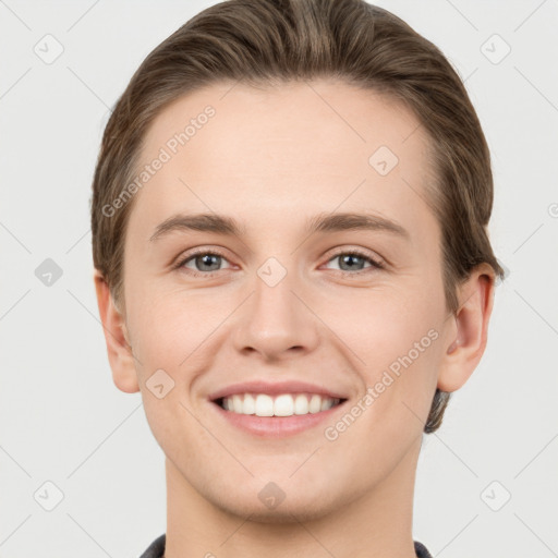 Joyful white young-adult female with short  brown hair and grey eyes