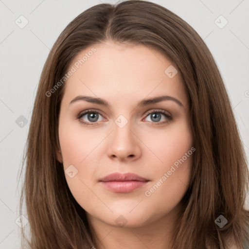 Neutral white young-adult female with long  brown hair and brown eyes