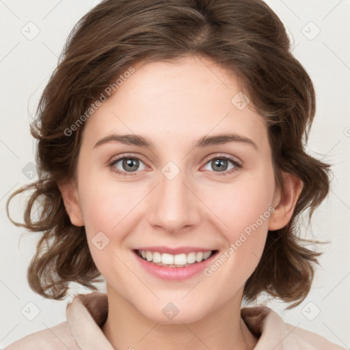 Joyful white young-adult female with medium  brown hair and green eyes