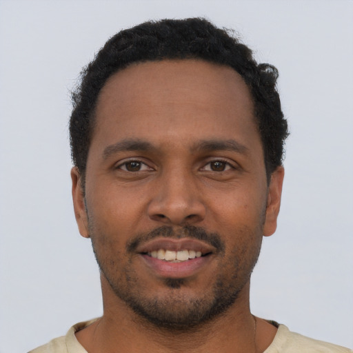 Neutral black young-adult male with short  brown hair and brown eyes