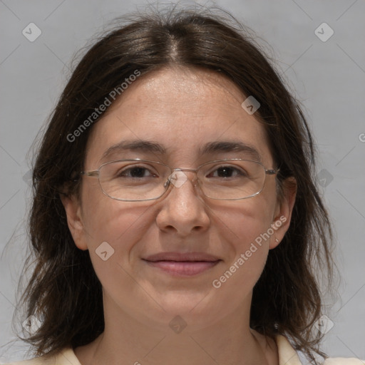 Joyful white adult female with medium  brown hair and brown eyes