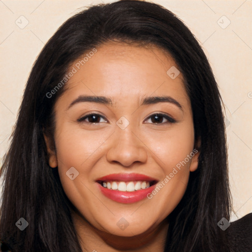 Joyful latino young-adult female with long  brown hair and brown eyes