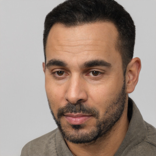Neutral white adult male with short  black hair and brown eyes