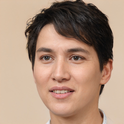 Joyful white young-adult male with medium  brown hair and brown eyes