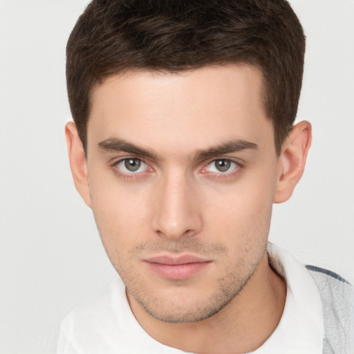 Neutral white young-adult male with short  brown hair and brown eyes