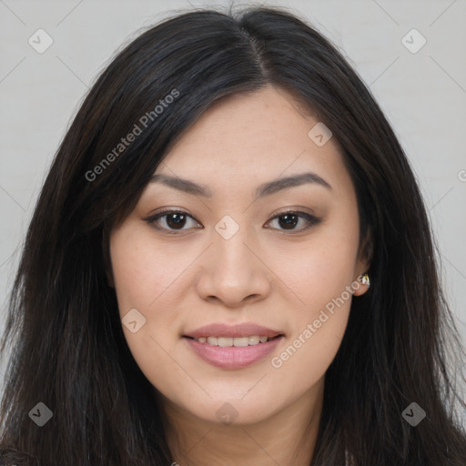 Joyful asian young-adult female with long  brown hair and brown eyes