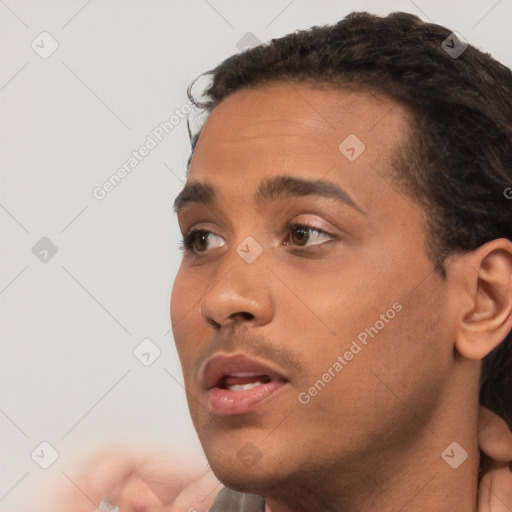 Neutral white young-adult male with short  black hair and brown eyes