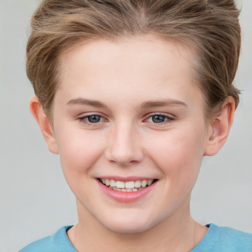 Joyful white child female with short  brown hair and grey eyes