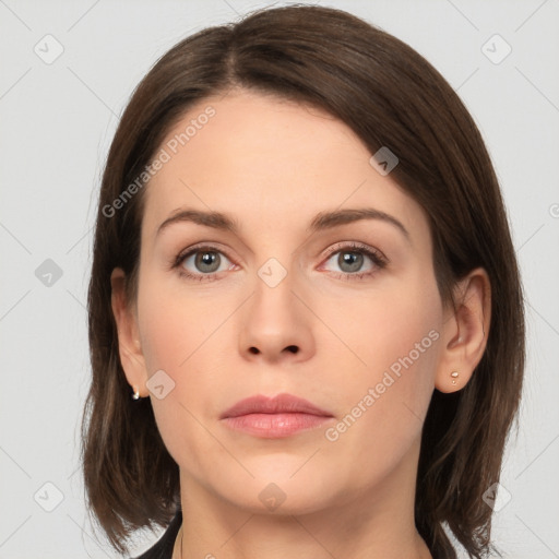 Neutral white young-adult female with medium  brown hair and grey eyes