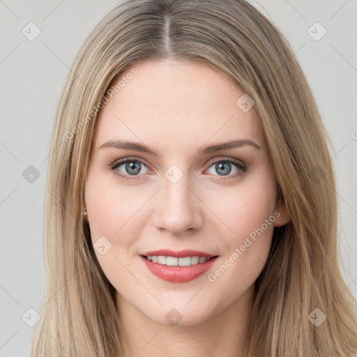 Joyful white young-adult female with long  brown hair and grey eyes